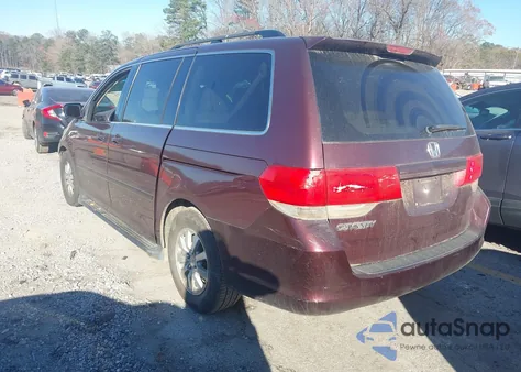 2010 Honda Odyssey Ex-L z USA, uszkodzony, nr VIN 5FNRL3H74AB036987